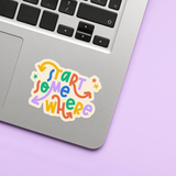 Colorful 'Start Somewhere' sticker on a laptop with a purple background