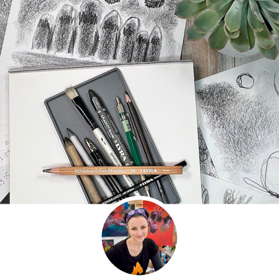Set of art supplies including pencils and markers on a drawing surface with a plant in the corner.