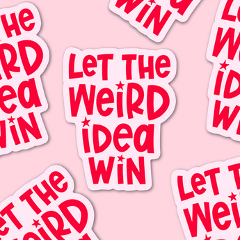 Stickers with 'Let the Weird Idea Win' text on a pink background