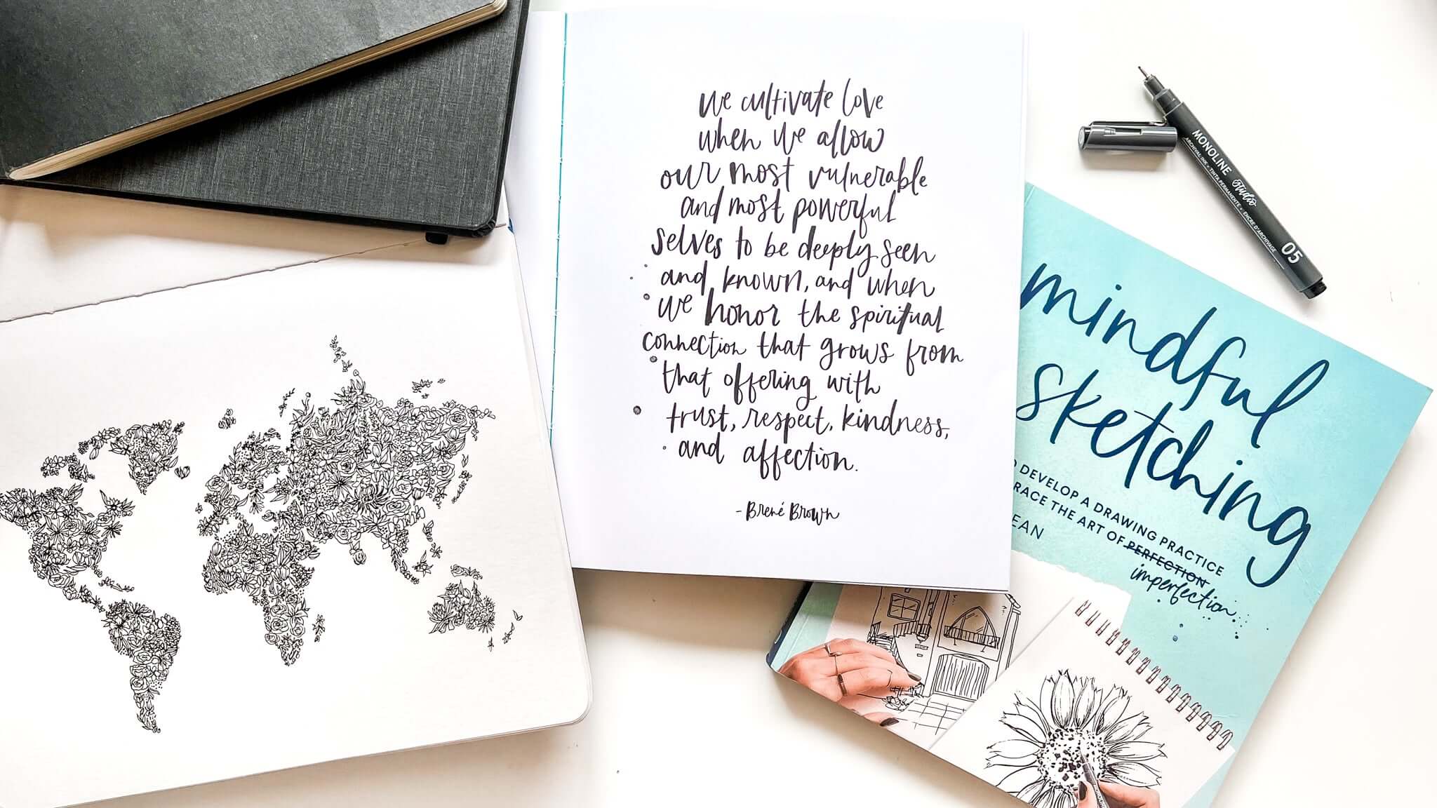 Mindful sketching book spread with a handlettered quote