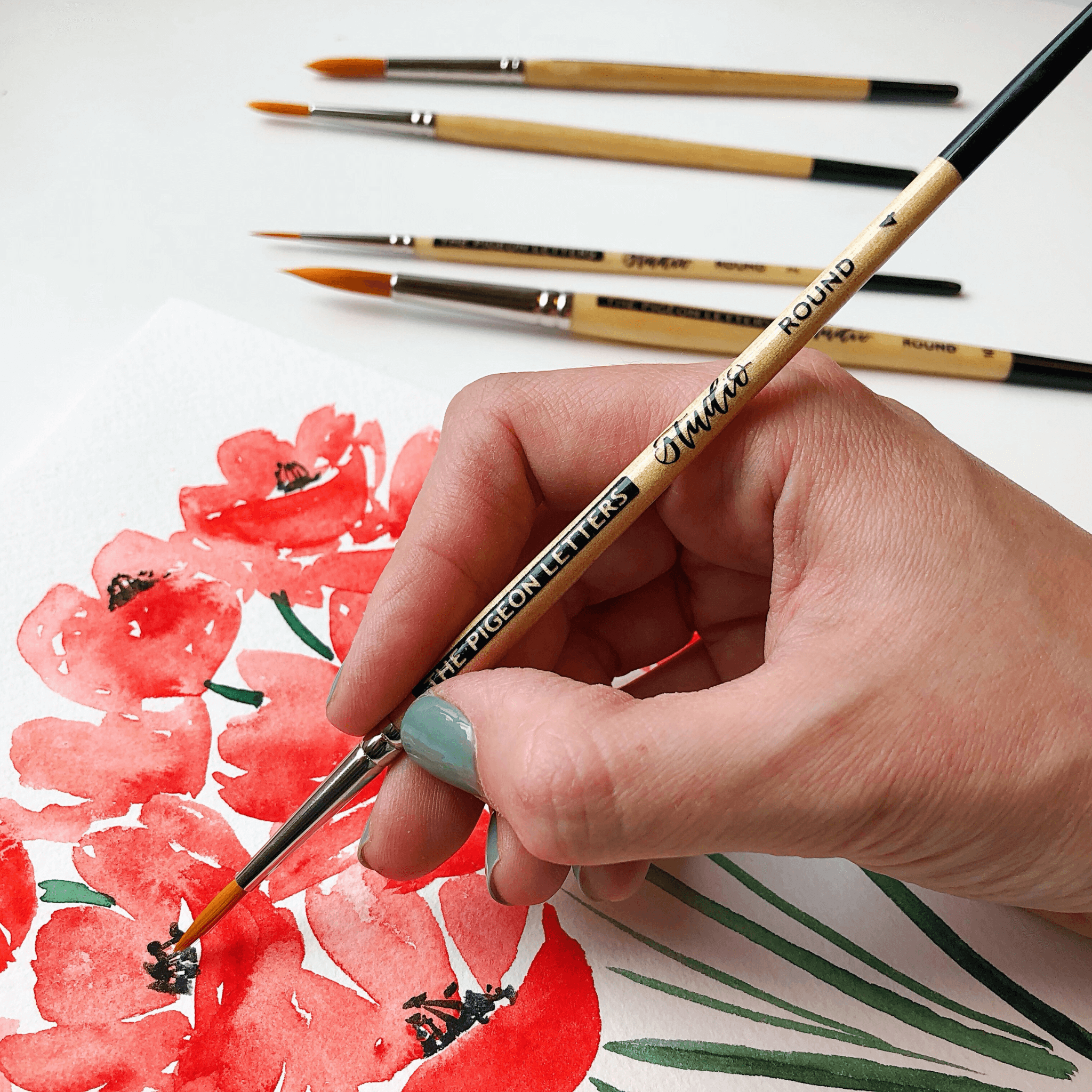 Adding details to watercolor poppy flowers